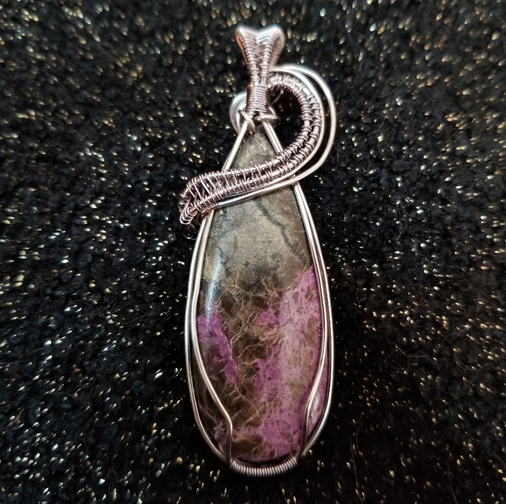 Purple Stichtite wire wrapped titanium color coated copper necklace